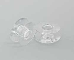 217 - Szpulka plastikowa  Husqvarna 10 sztuk , stożkowy trzpień