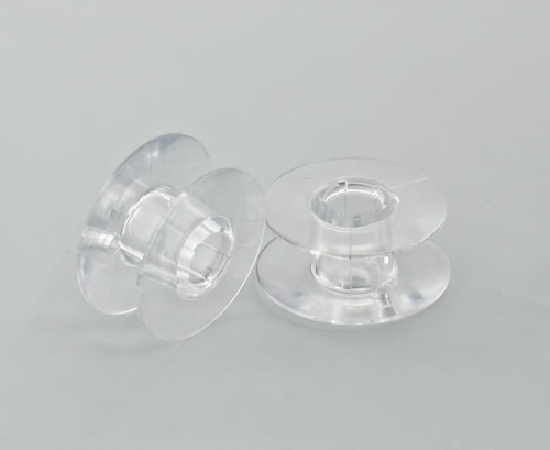 217 - Szpulka plastikowa  Husqvarna 10 sztuk , stożkowy trzpień