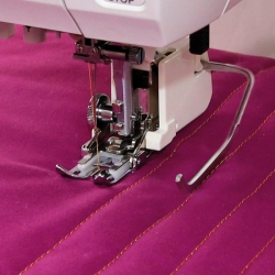 Stopka z górnym transportem i prowadnikiem Janome 9mm